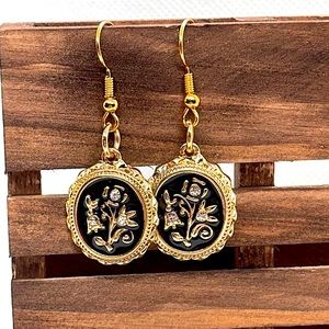 Handmade jewelry artist made earrings gold with black enamel and rhinestones